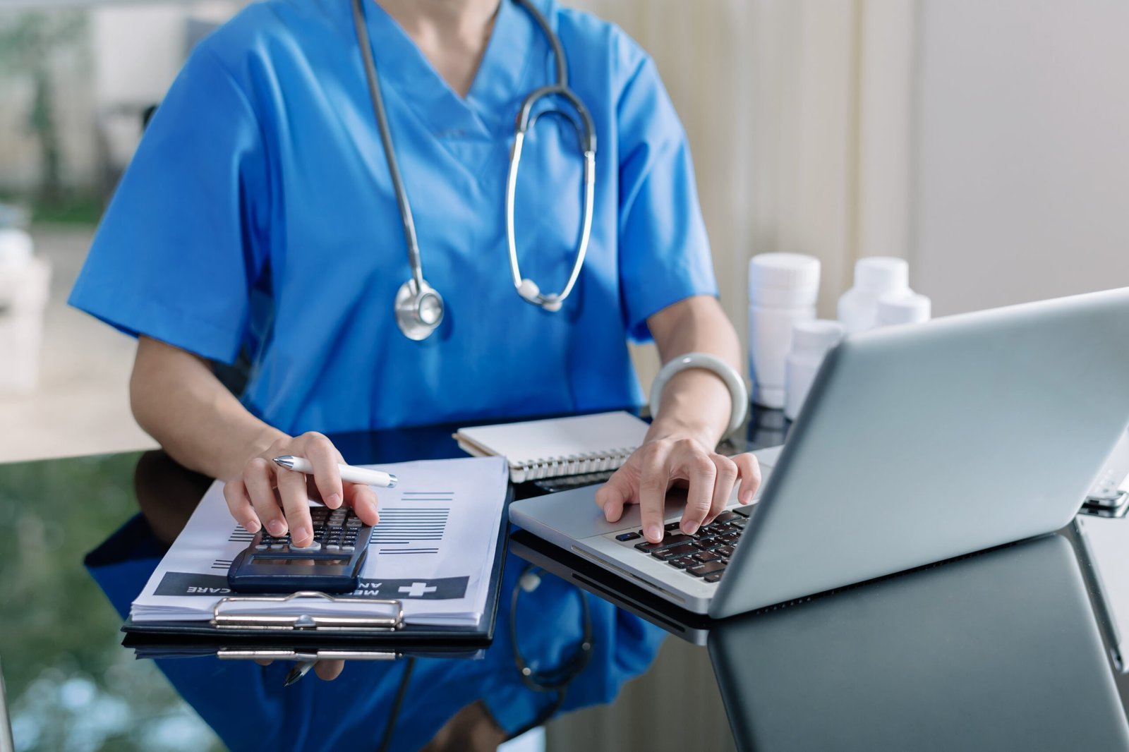 Medical billing specialist performing rcm in medical billing using healthcare analytics software