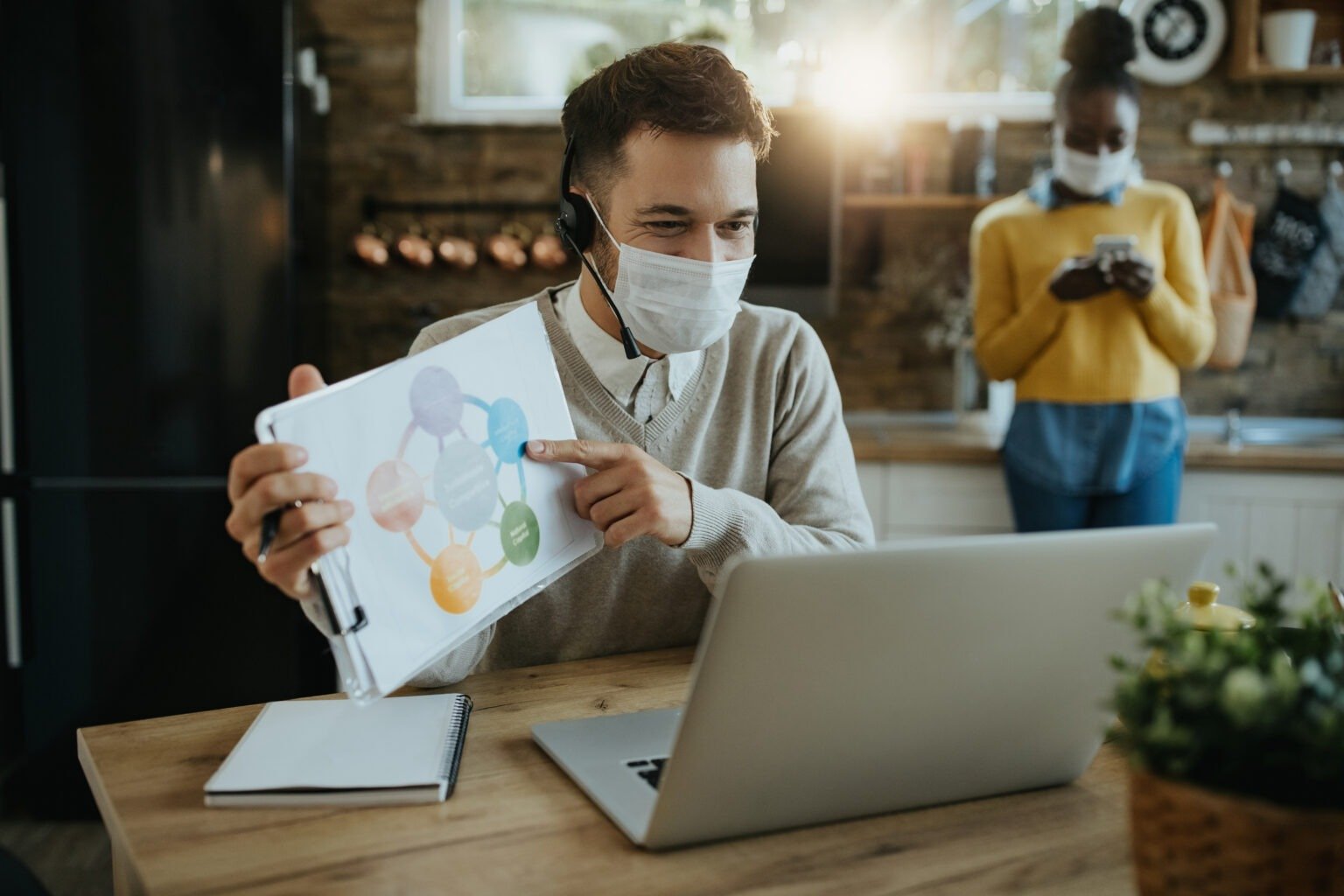 Doctor analyzing financial reports to improve medical billing efficiency in Alabama