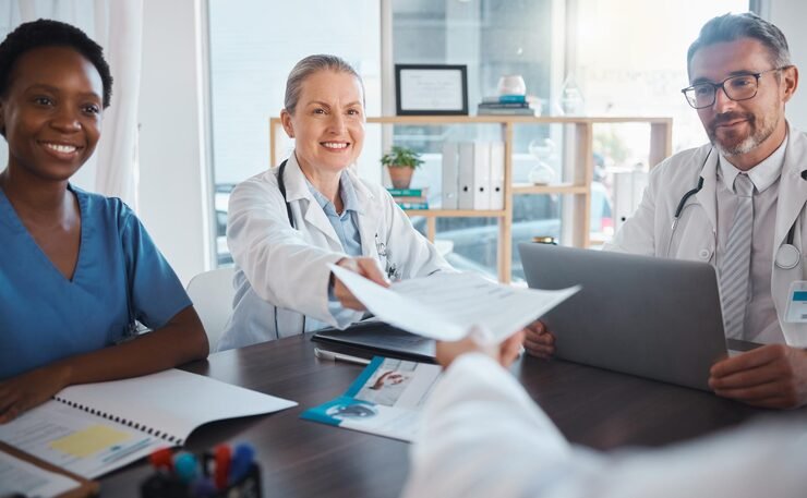 Healthcare professionals reviewing medical billing reports in Ohio clinic