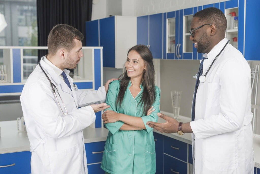 Healthcare professionals discussing patient records and billing workflow in a Texas medical practice